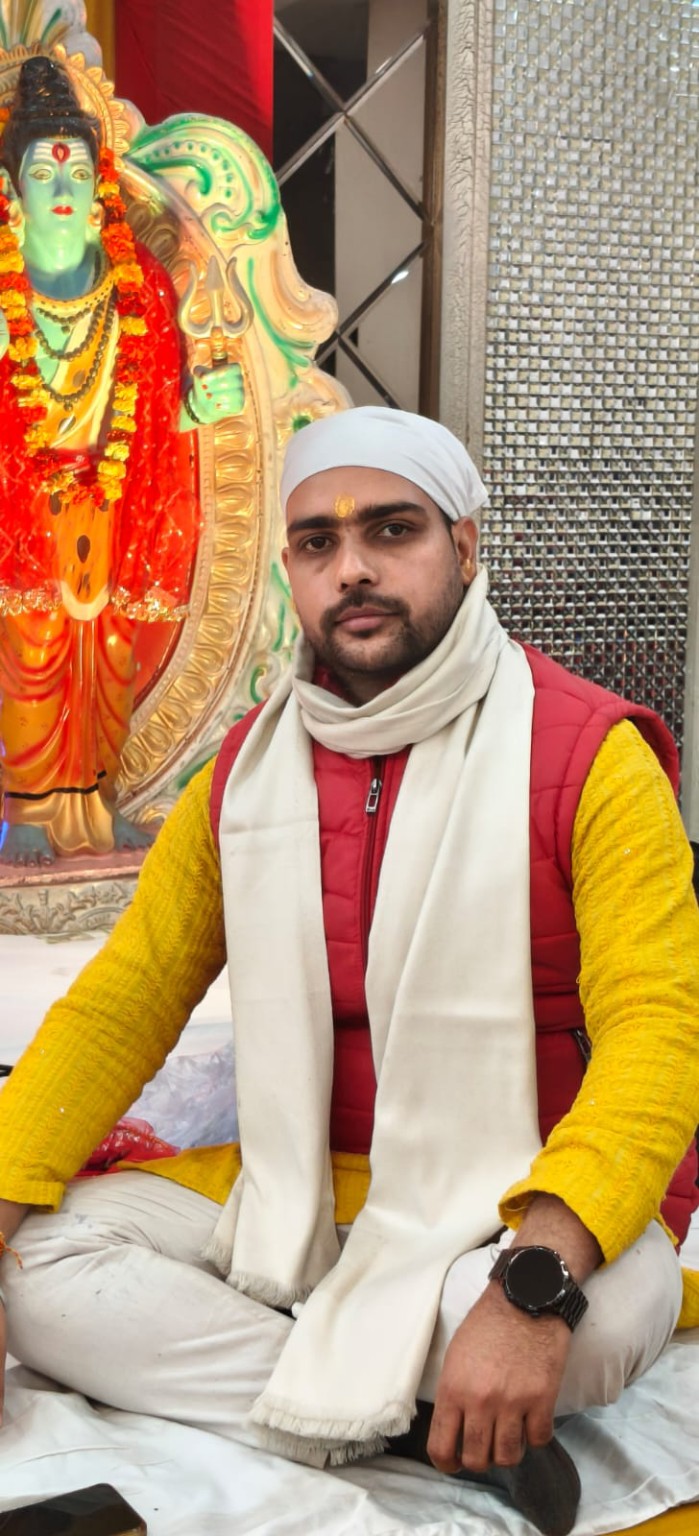 Abhishek Kumar Dubey with deity